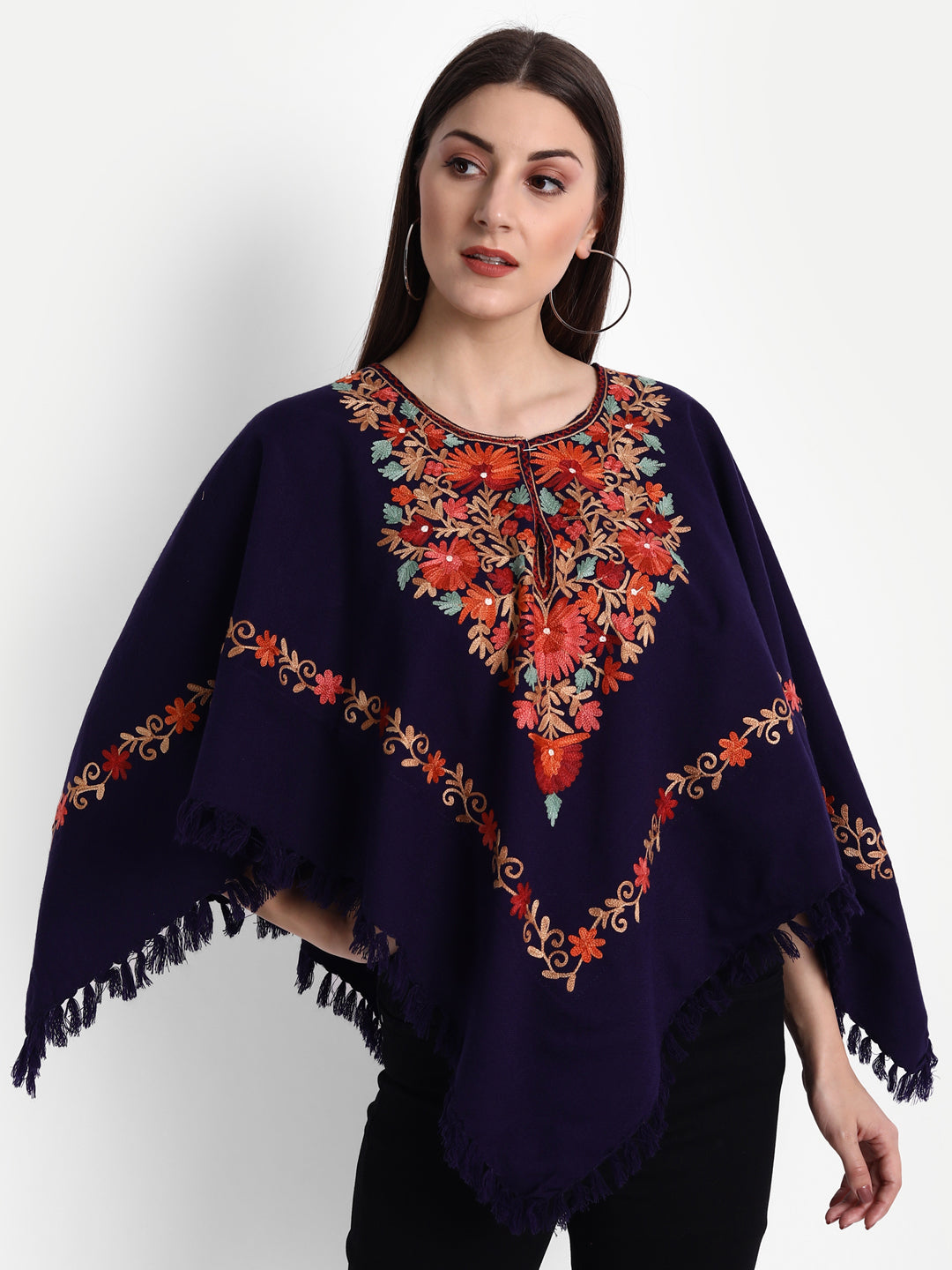 https://cdn.shopify.com/s/files/1/0629/9847/9063/products/WoolenPonchowithKashmiriEmbroideryandSilkLiningforWomenBlue2.jpg?v=1743766686